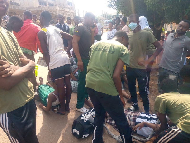 Some of the affected students being given first aid at the school